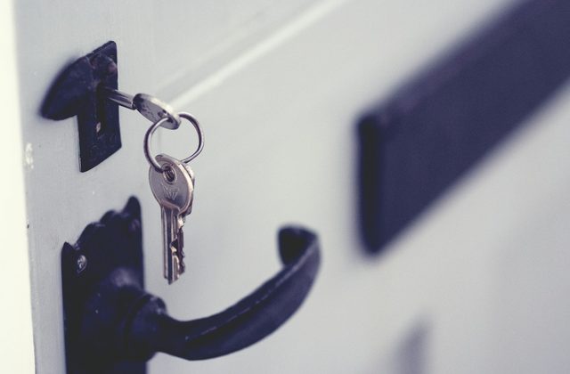 House keys hanging by a front door