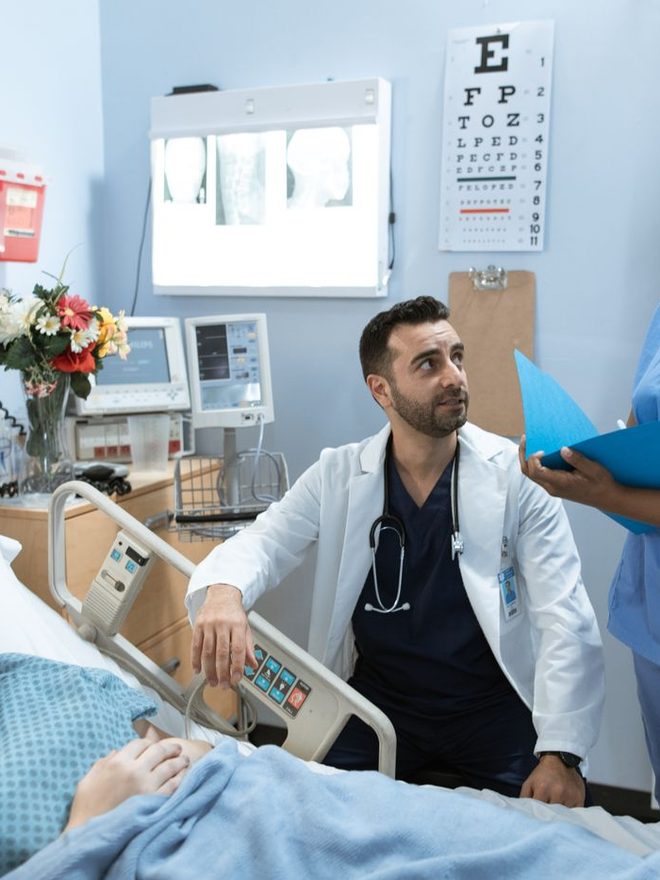 Hospital staff attending to a patient