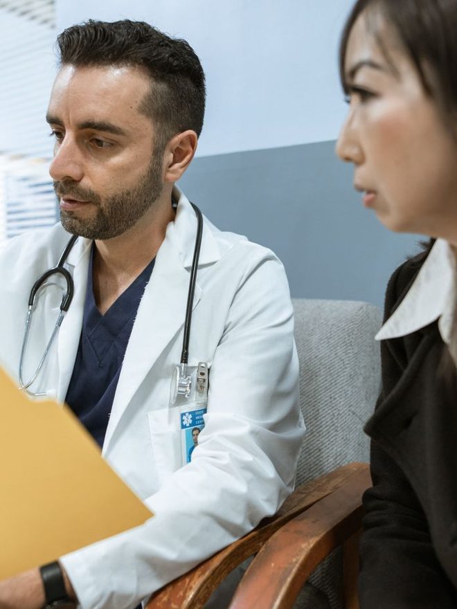 Doctor discussing treatment with a patient